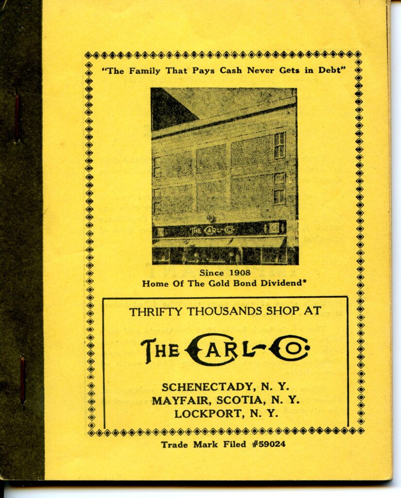 Yellow book for saving department store stamps. The cover says "The Family That Pays Cash Never Gets in Debt" above a picture of The Carl Co. in Schenectady, "Since 1908 Home of the Gold Bond Divident." Then it says Thrifty thousands shop at The Carl Company, Schenectady, Mayfair (Scotia) and Lockport, NY.